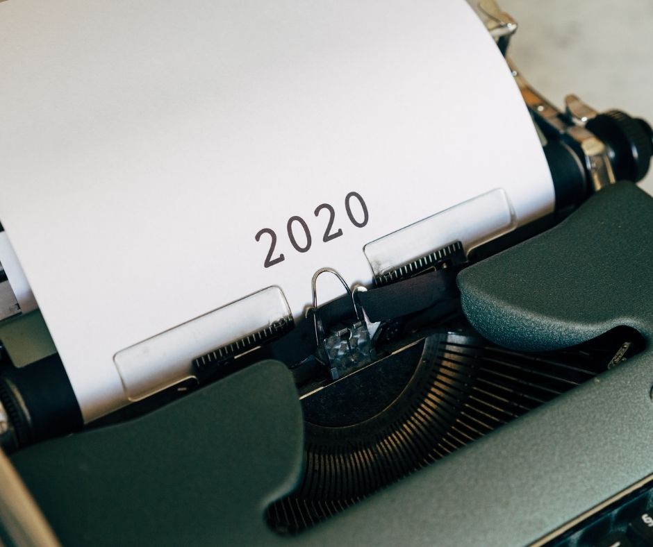 Image of a typewriter with a paper coming out the top. text reads 2020