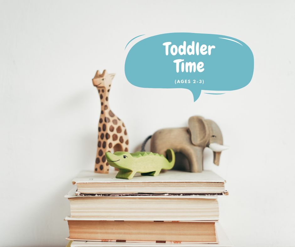 Image of a wooden toy giraffe, alligator, and elephant standing on a stack of books. Text reads "toddler time ages 2-3"
